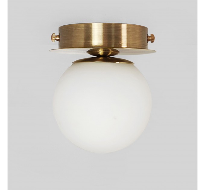 Латунний настінний світильник - освітлення для ванної кімнати